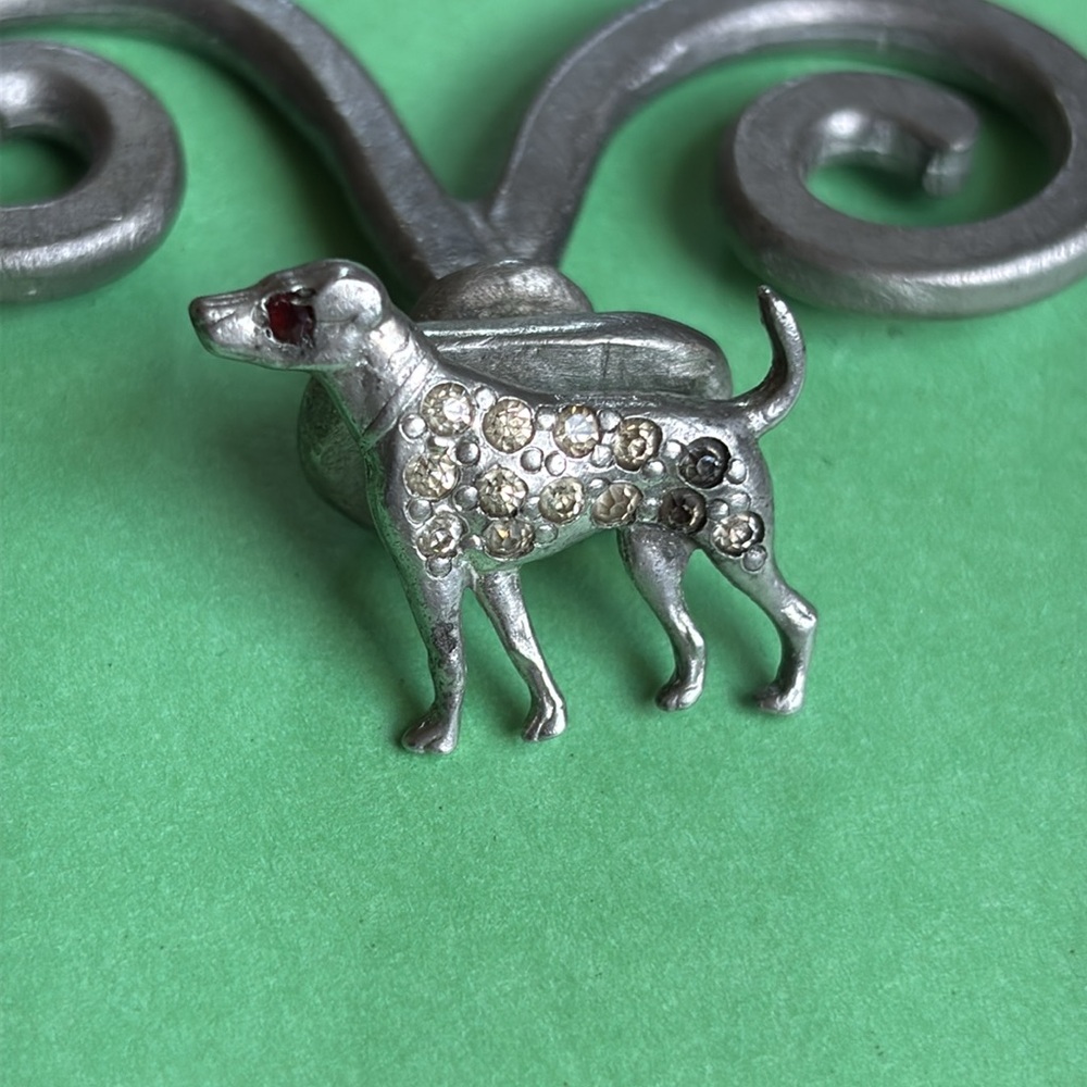Unique Vintage Silver Dog Pin, covered in rhinestones with a jeweled red eye
